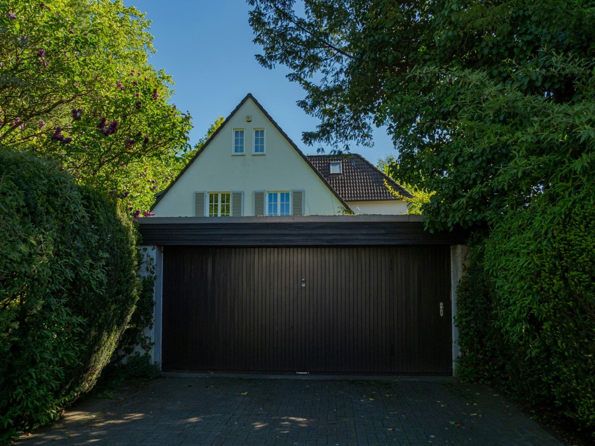 Sydney home with a premium timber double garage door installed by Premium Garage Doors