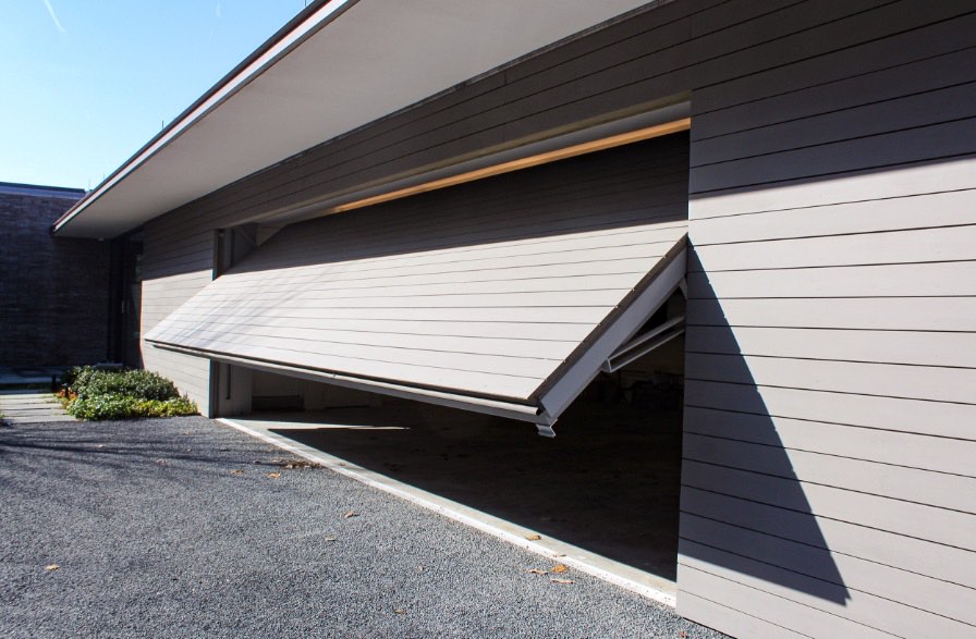 Tilt garage doors